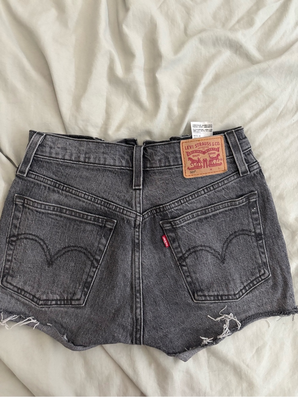 Levi's Women's Black Washed High-Rise Denim Cutoff Shorts - Picture 2 of 3